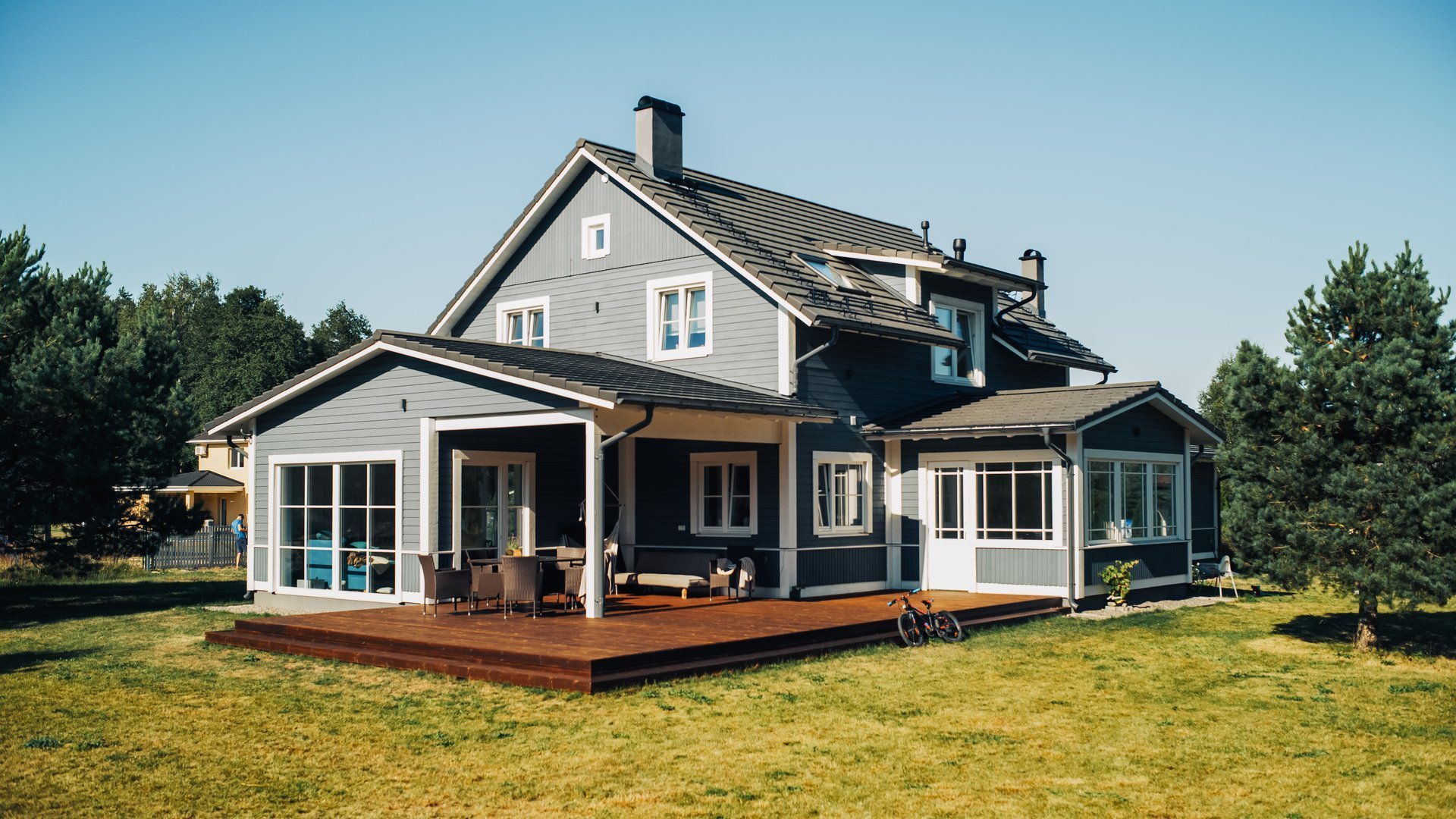 American Style Country House on a Striking Summer Day with Blue Sky