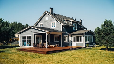 American Style Country House on a Striking Summer Day with Blue Sky