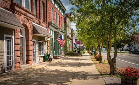 Main street U.S.A. store fronts on a summer day in a small town.