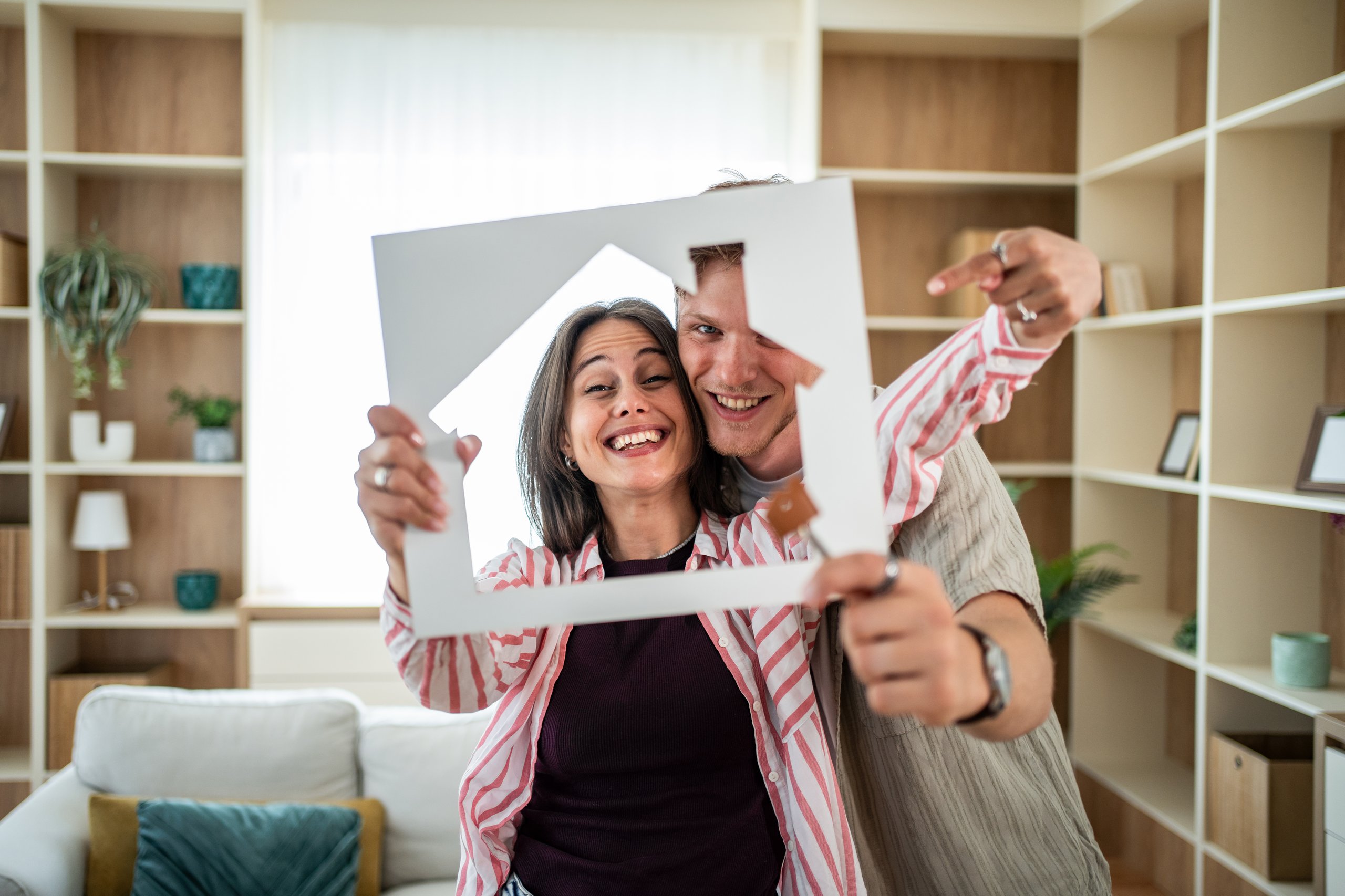 Happy homeowners receiving keys