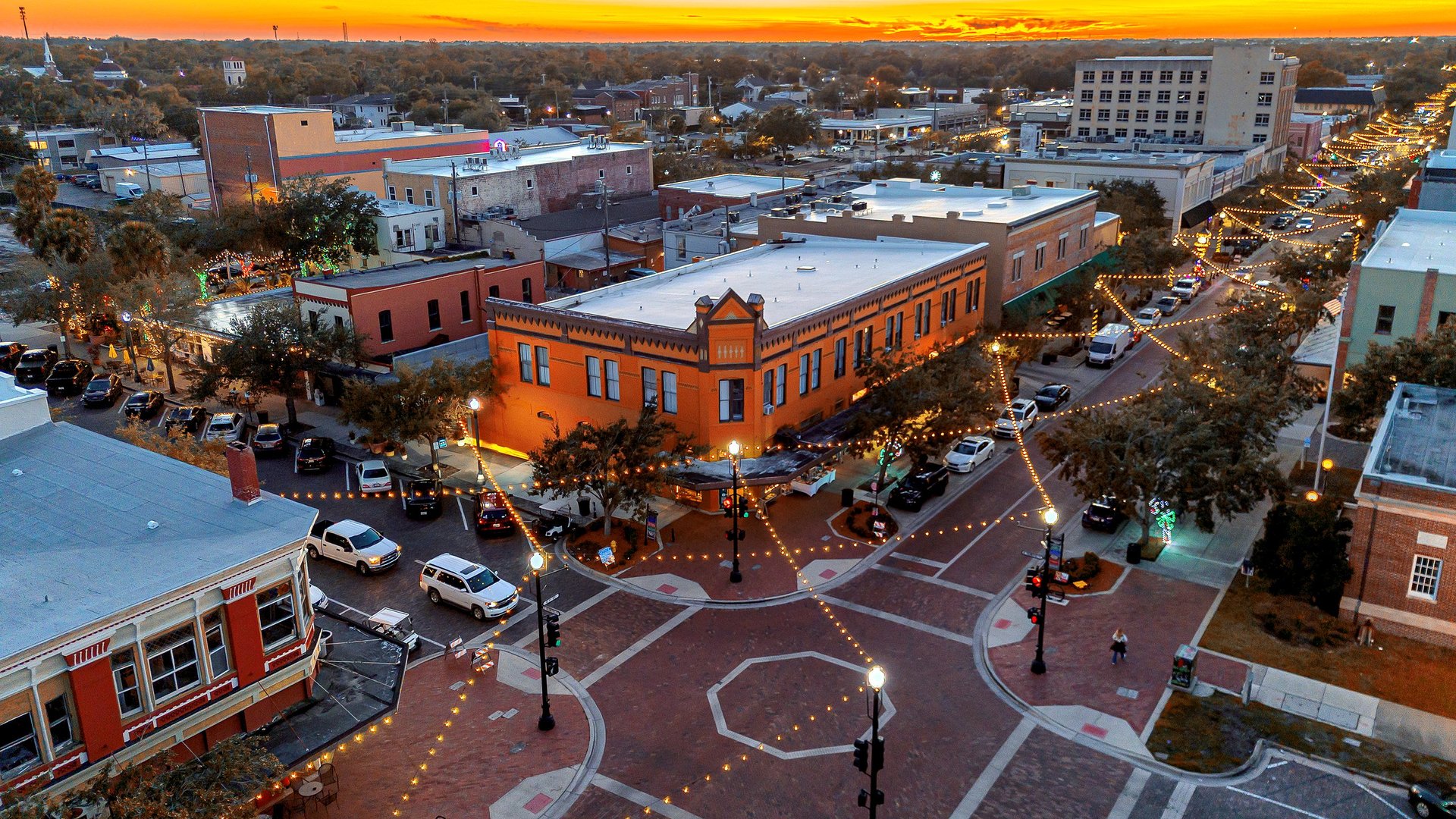 Aerial view of a historic downtown urban cityscape at sunset