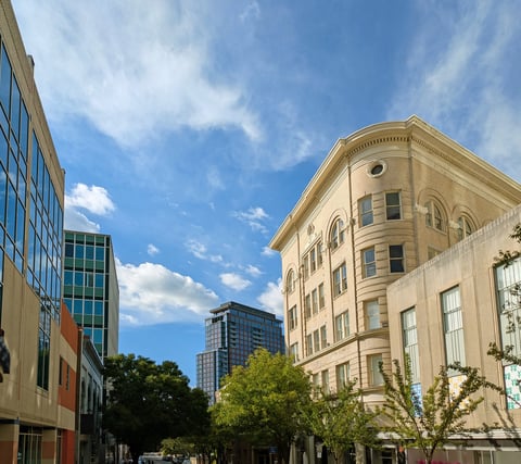 Main Street in downtown Durham North Carolina with a mix of modern and classic architecture